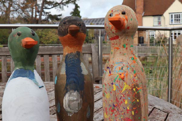 Painted ducks to help grieve daddy